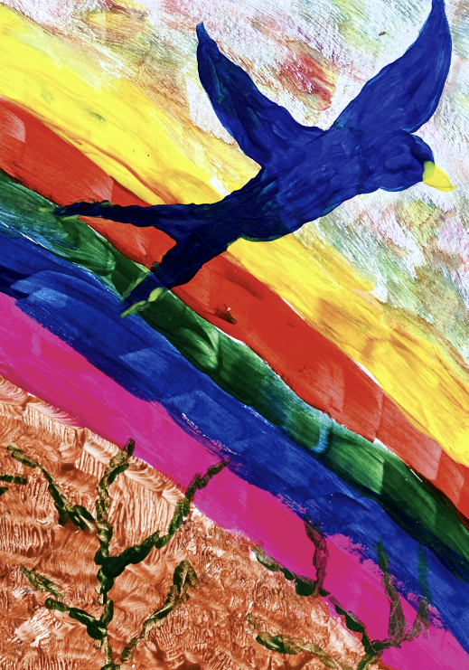 Blue bird flying high